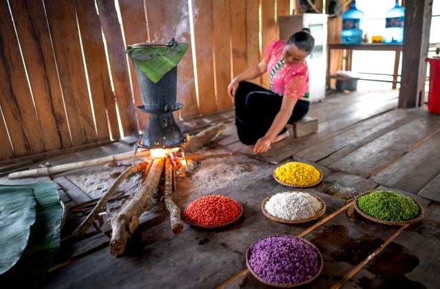 Mother and children with improved cookstove